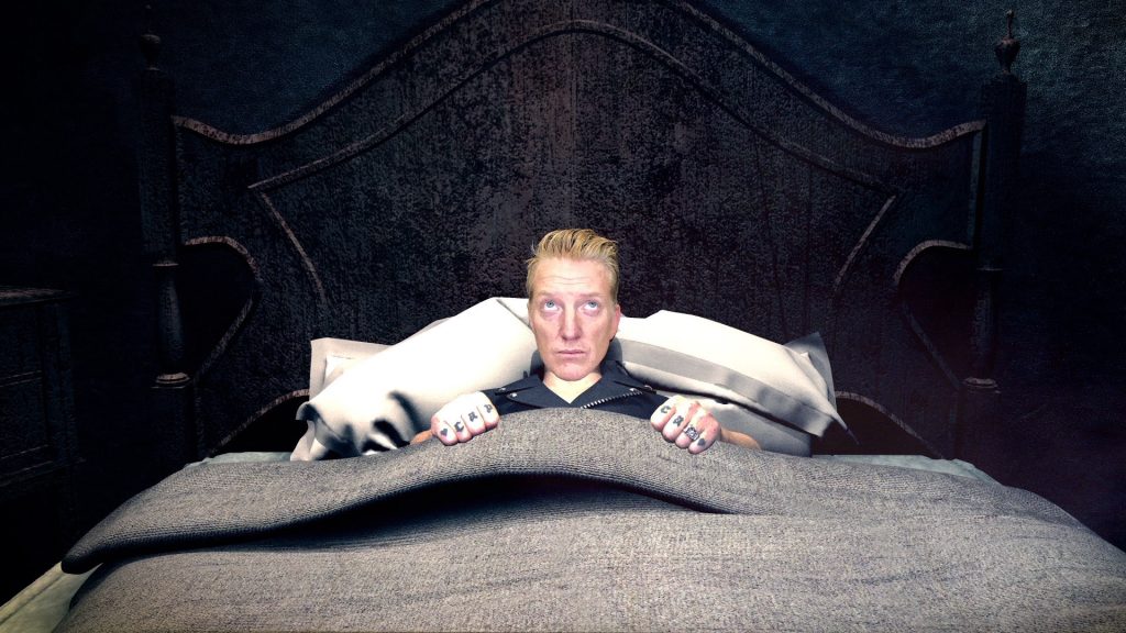 Queens of the Stone Age premiere “Head Like a Haunted House” video