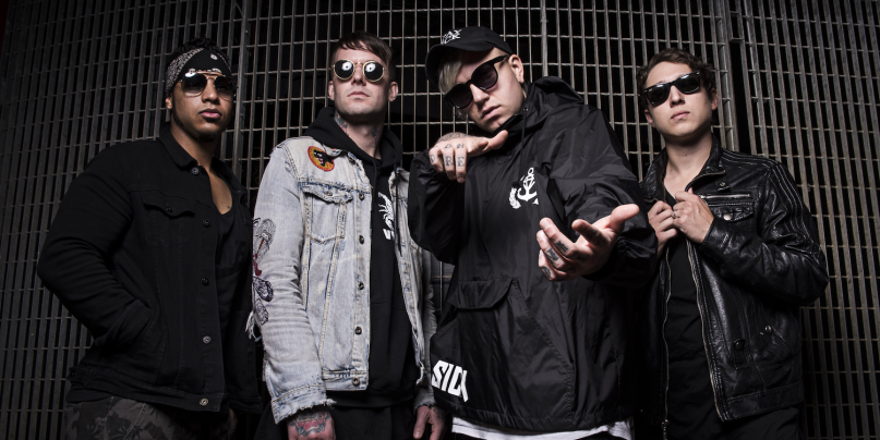 Attila upset the internet after band members kiss on stage