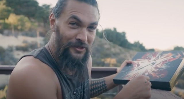 Jason Momoa reacts to his early copy of Metallica’s ‘S&M2’